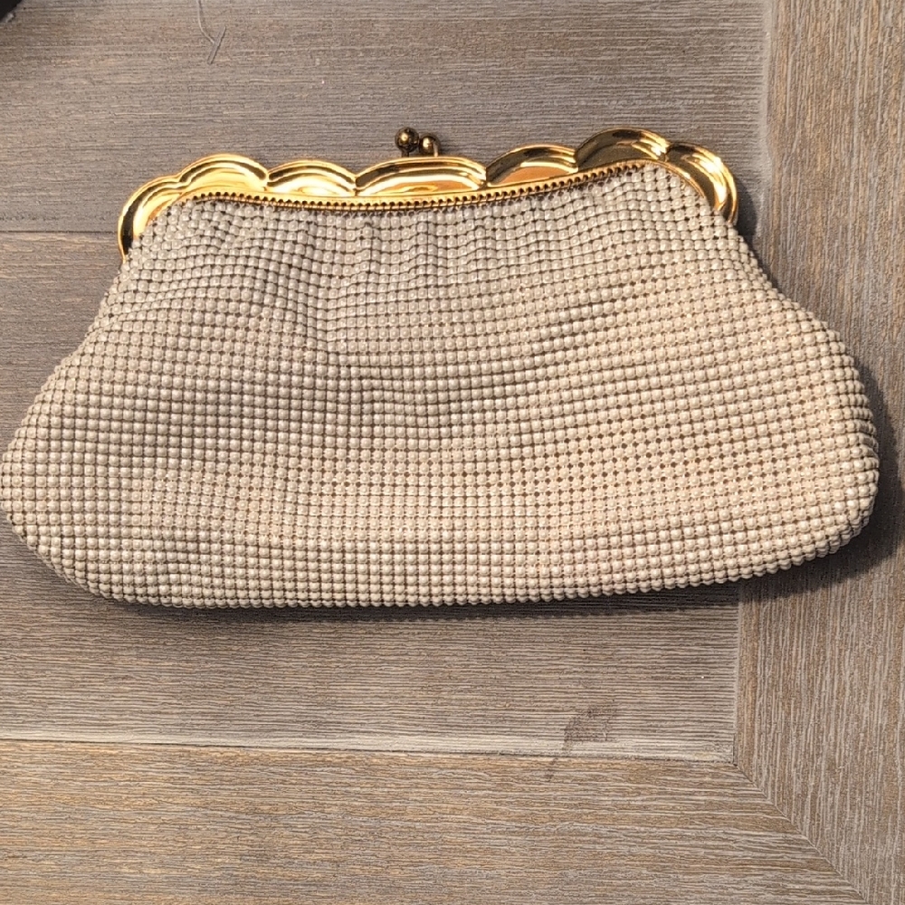 Elegant Beige Clutch with Gold Accents